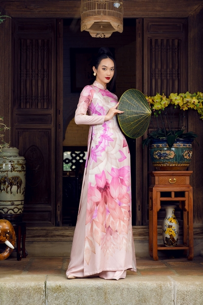 Traditional Vietnamese dress with pink lotus pattern