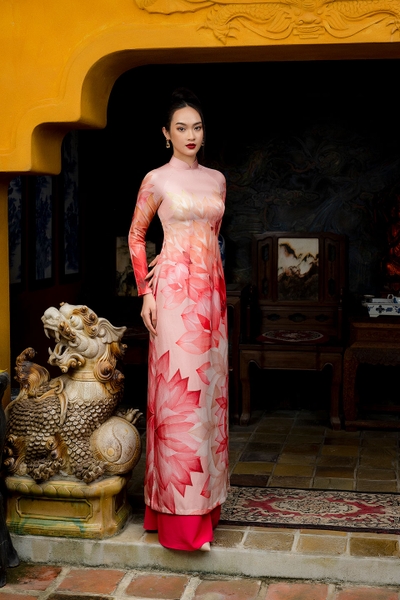 Traditional Vietnamese dress with red lotus pattern
