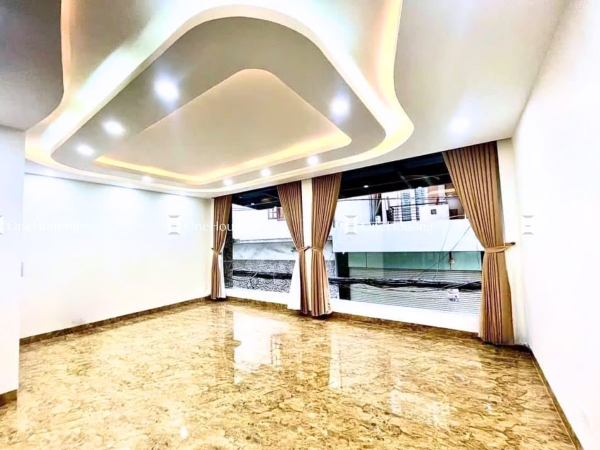Nhà mặt ngõ cách Nguyễn Khang 5m, diện tích 53m² x 7 tầng, mặt tiền 6.5m