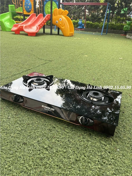 Bếp gas dương kính Sunhouse SHB2025, Mặt kính cường lực dày 7mm, Đầu đốt bằng hợp kim đồng, Kiềng thép tráng men siêu bền, Bảo hành 12 tháng