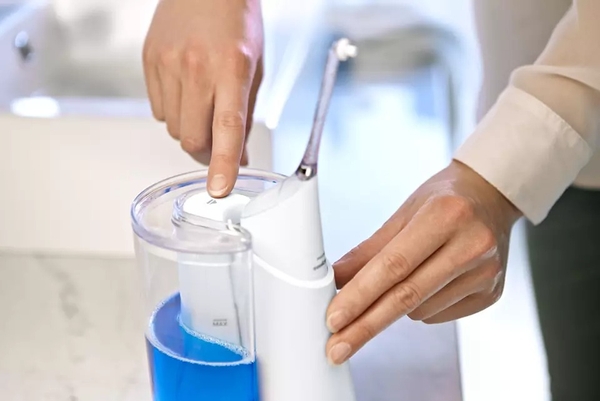 Bộ sản phẩm máy tăm nước Philips Sonicare AirFloss with Fill and Charge Station