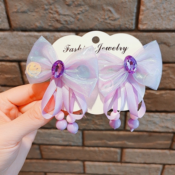 Set 2 kẹp tóc nơ phối đá hạt vòng