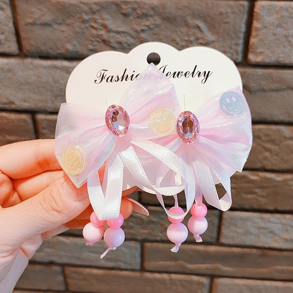 Set 2 kẹp tóc nơ phối đá hạt vòng