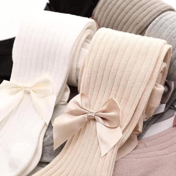 Quần tất len đính nơ cho bé