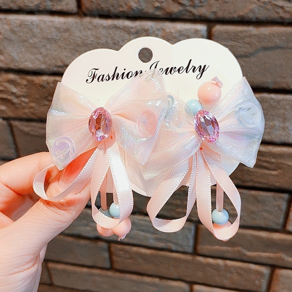 Set 2 kẹp tóc nơ phối đá hạt vòng