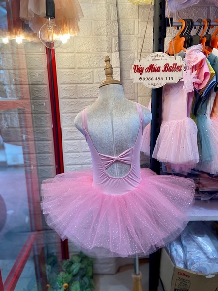 Váy múa dây nơ đáp ngực hồng lấp lánh