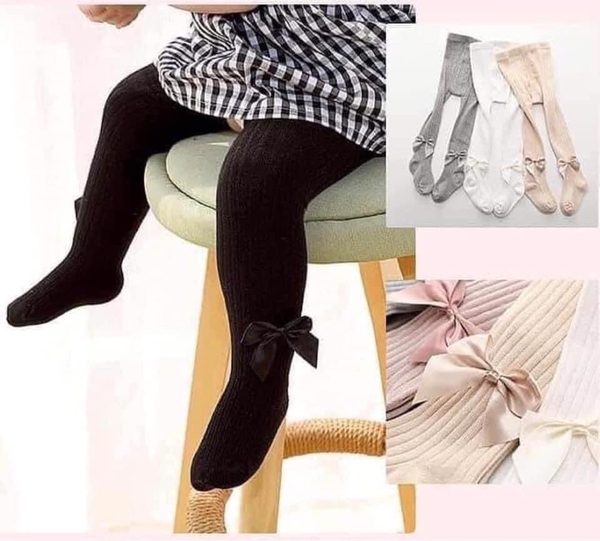 Quần tất len đính nơ cho bé