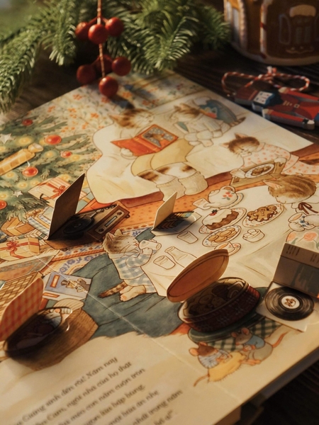 Combo 2 cuốn Gia Đình Mèo Cam: Giáng Sinh Lung Linh + Bốn Mùa Yêu Thương