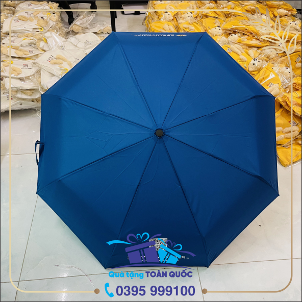 ô dù mầu xanh, ô dù in logo, xưởng sản xuất ô dù cầm tay giá rẻ, xưởng sản xuất ô dù tại hà nội và sài gòn, ô dù quảng cáo, quà tặng 100k, quà tặng khuyến mại, quà tặng khách hàng, ô dù vecta center