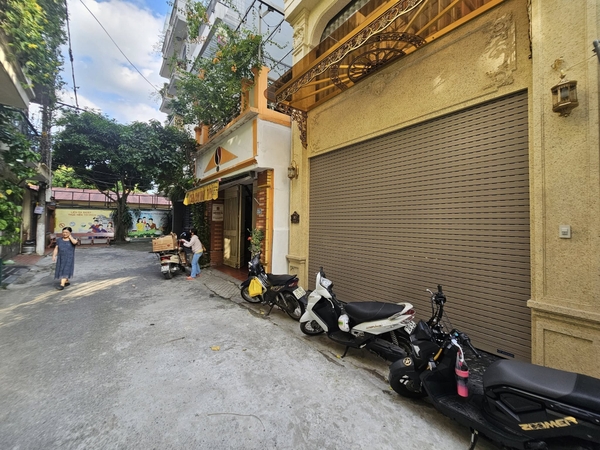 Bán nhà phân lô chân cầu Vĩnh Tuy, 7 tầng, DT 90m2, MT 5m, 4PN, có thang máy, gara