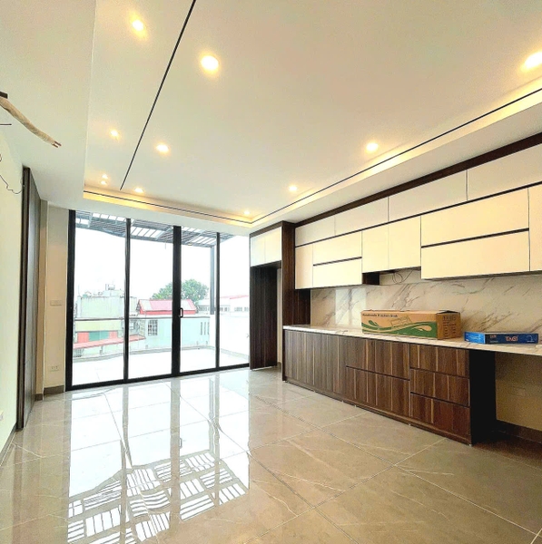 Bán nhà mặt ngõ Sài Đồng, 7 tầng, DT 53m2, MT 4m, 4PN, thang máy, gara ô tô, 2026