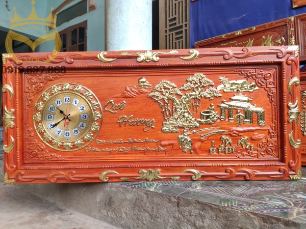 Tranh đồng hồ gỗ hương đục khung thếp vàng Quê Hương 108x48cm - TGM2005