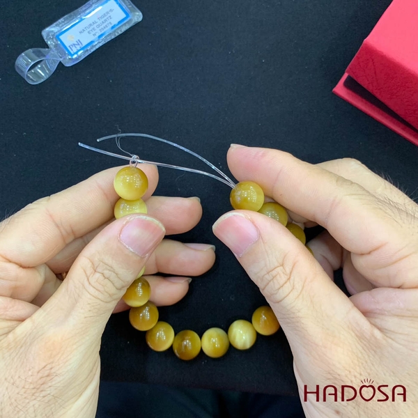 Hướng dẫn xỏ dây vòng đá phong thủy Hadosa