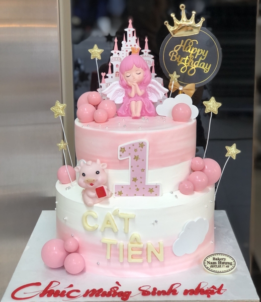 Bánh 2 tầng em bé thiên thần ngủ lâu đài, trâu hồng, thôi nôi đầy năm cho bé tuổi Sửu [MS: 0132]