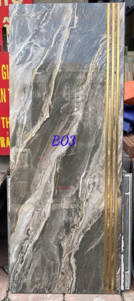 gach-bac-cau-thang-nhap-khau-47x120cm-dong-chat-phu-anh-kim