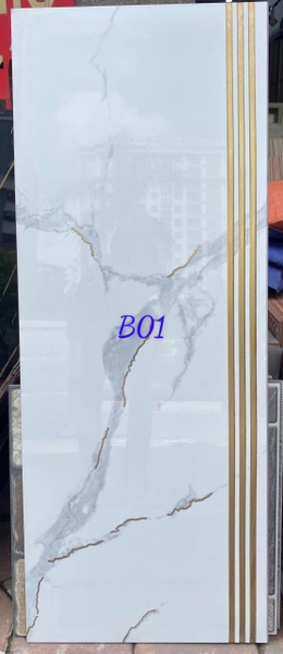gach-bac-cau-thang-nhap-khau-47x120cm-dong-chat-phu-anh-kim