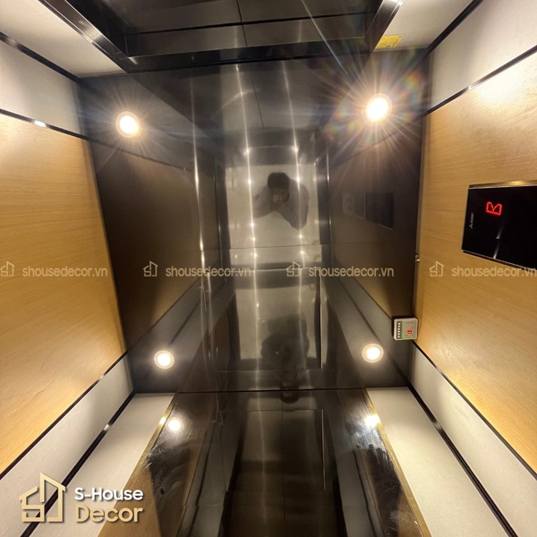 tran-trang-tri-cabin-thang-may