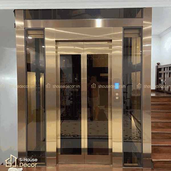 Ốp inox cho thang máy kính