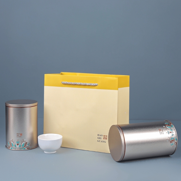 Hộp trà thiếc hình trụ tròn hoạ tiết hoa văn mẫu mới - HVL TEA