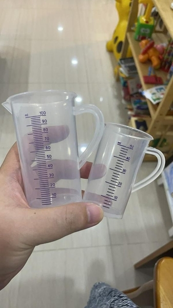 Ca đong 100ml vạch tím