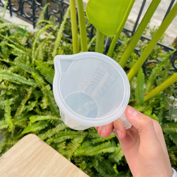 Ca đong nhựa | Dung tích 500ml | Có nắp