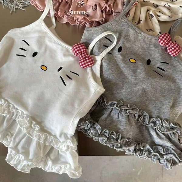 SÉT 2 VÁY 2S KITTY BÈO 2 TẦNG NƠ BÔNG TONE TRẮNG GHI CHO BÉ GÁI NEW