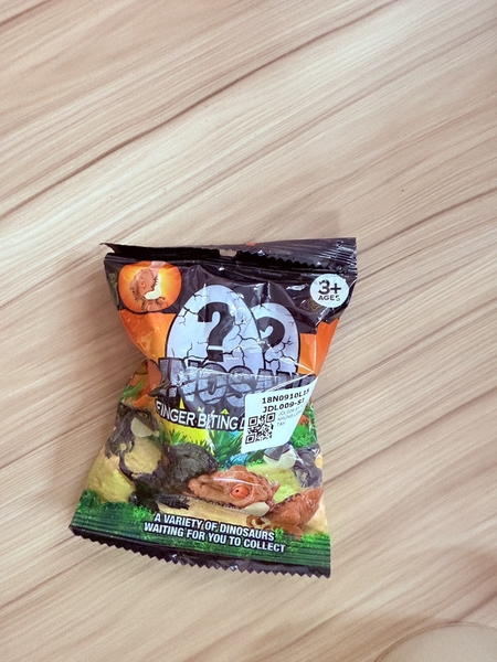 JDL009-S1 TÚI MÙ KHỦNG LONG CẮN TAY