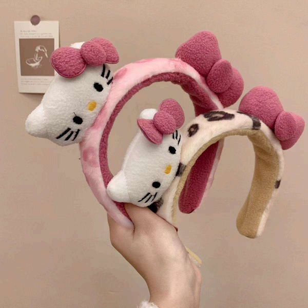 Cài tóc băng đô lông xù Kitty nơ da beo
