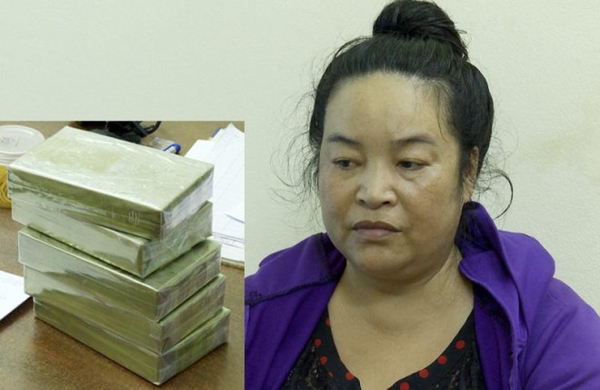 Bắt người phụ nữ mang 5 bánh heroin lên taxi