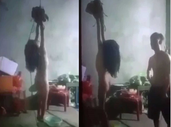 Xôn xao clip bé gái 11 tuổi bị bố treo lên trần nhà đánh đập