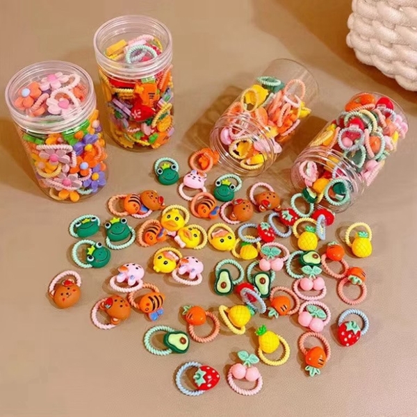 Lọ 30 dây buộc tóc gắn cham cho bé