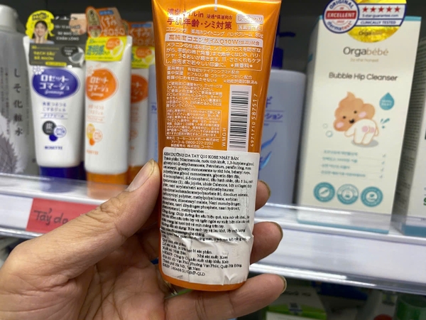 Kem dưỡng da tay Q10 Kose Nhật Bản màu Vàng cho da thường (Whitening Medicated Moisture Cream)