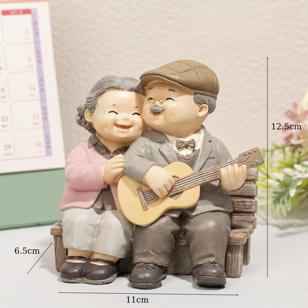 Đồ chơi trang trí ông bà đánh đàn(OB)