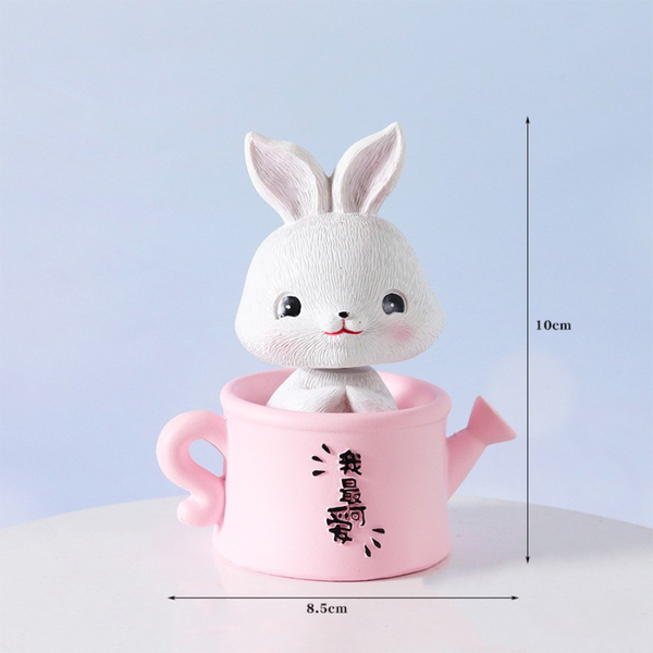 Đồ chơi Thỏ sứ ngồi bình tưới màu HỒNG