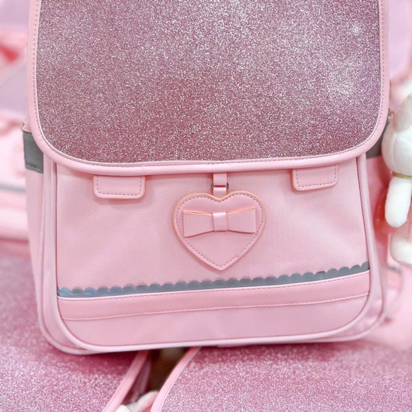 Balo chống gù HỒNG NHŨ tai thỏ kèm móc khóa size 38x30x13cm