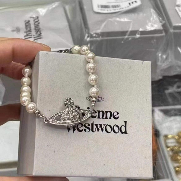 Vòng tay ngọc trai 2 màu bạc, vàng hãng Vivienne West Wood