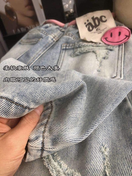Quần baggy jean cạp chun phối dây hồng mặt cười cho bé gái