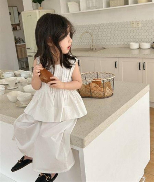 Set bộ thô Sofia Candy áo peplum sát nách mix quần ống rộng 2 màu trắng, nâu