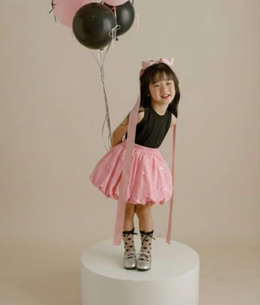 Chân váy bí Size 9-13Y hãng Winwin đính nơ 3 màu đen, trắng, hồng