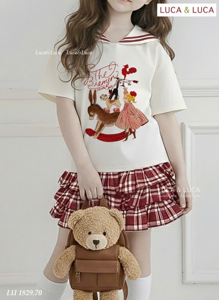Bộ cộc tay Luca&Luca cổ thuỷ thủ áo be rạp xiếc chân váy kẻ caro tầng đỏ