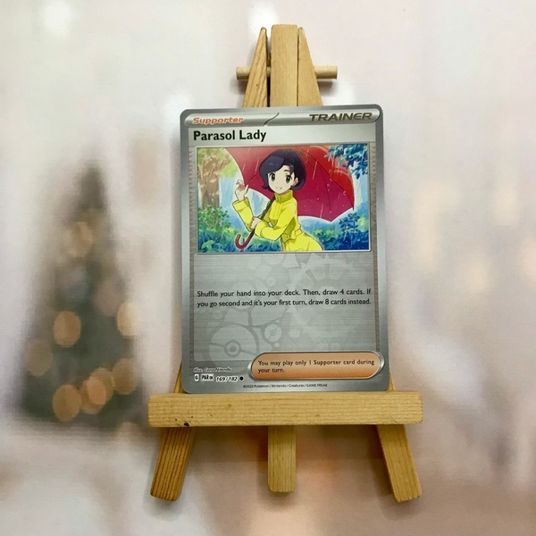 Thẻ hình Pokemon Parasol Lady 169/182 - Lá bài lẻ Paradox Rift Common Reverse Holo tiếng Anh chính hãng