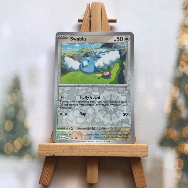 Thẻ hình Pokemon Swablu 169/197 - Lá bài lẻ Obsidian Flames Common Reverse Holo tiếng Anh chính hãng