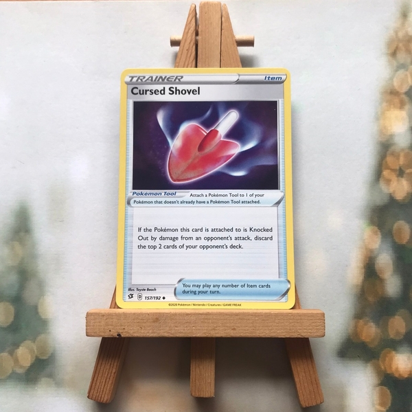 Thẻ hình Pokemon Cursed Shovel 157/192 - Lá bài lẻ Uncommon tiếng Anh chính hãng
