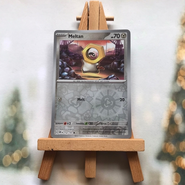 Thẻ hình Pokemon Meltan 152/197 - Lá bài lẻ Obsidian Flames Common Reverse Holo tiếng Anh chính hãng