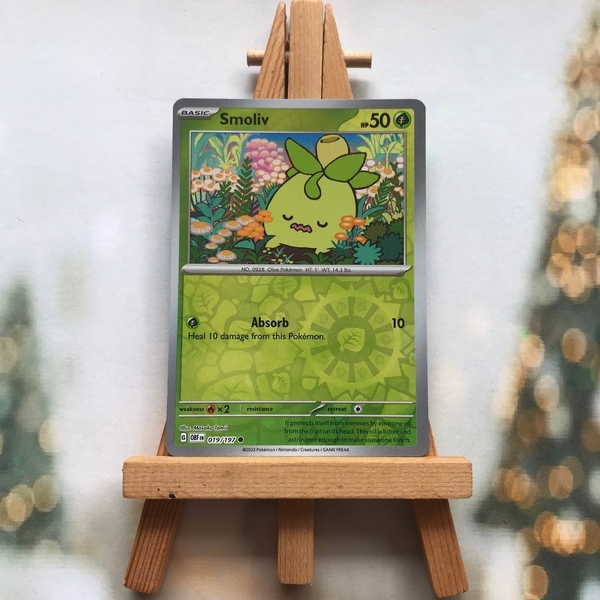 Thẻ hình Pokemon Smoliv 019/197 - Lá bài lẻ Scarlet & Violet: Obsidian Flames Common Reverse Holo tiếng Anh chính hãng ảnh 2