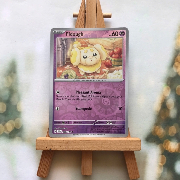 Thẻ hình Pokemon Fidough 066/142 - Lá bài lẻ Stellar Crown Common Reverse Holo tiếng Anh chính hãng