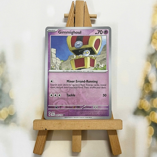 Thẻ hình Pokemon Gimmighoul 097/191 - Lá bài lẻ Surging Sparks Common Reverse Holo tiếng Anh chính hãng