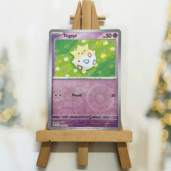 Thẻ hình Pokemon Togepi 070/191 - Lá bài lẻ Surging Sparks Common Reverse Holo tiếng Anh chính hãng