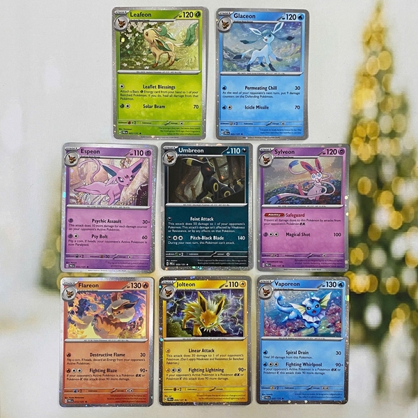 Thẻ hình Pokemon Eevee Evolves Cosmos Holo Promo từ hộp 8-tin Exclusive Prismatic Evolution chính hãng ảnh 2