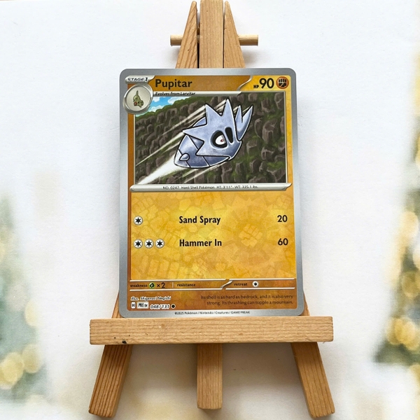 Thẻ hình Pokemon Pupitar 048/131 - Lá bài lẻ Prismatic Evolutions Common Reverse Holo tiếng Anh chính hãng